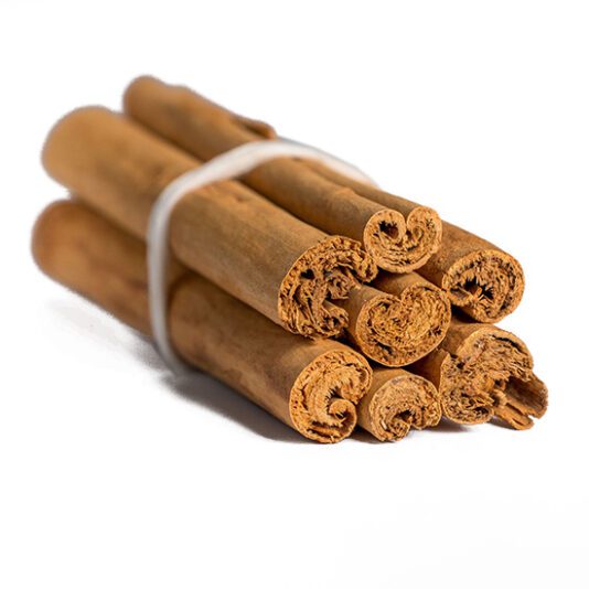 Ceylon cinnamon sticks on white background. True cinnamon.